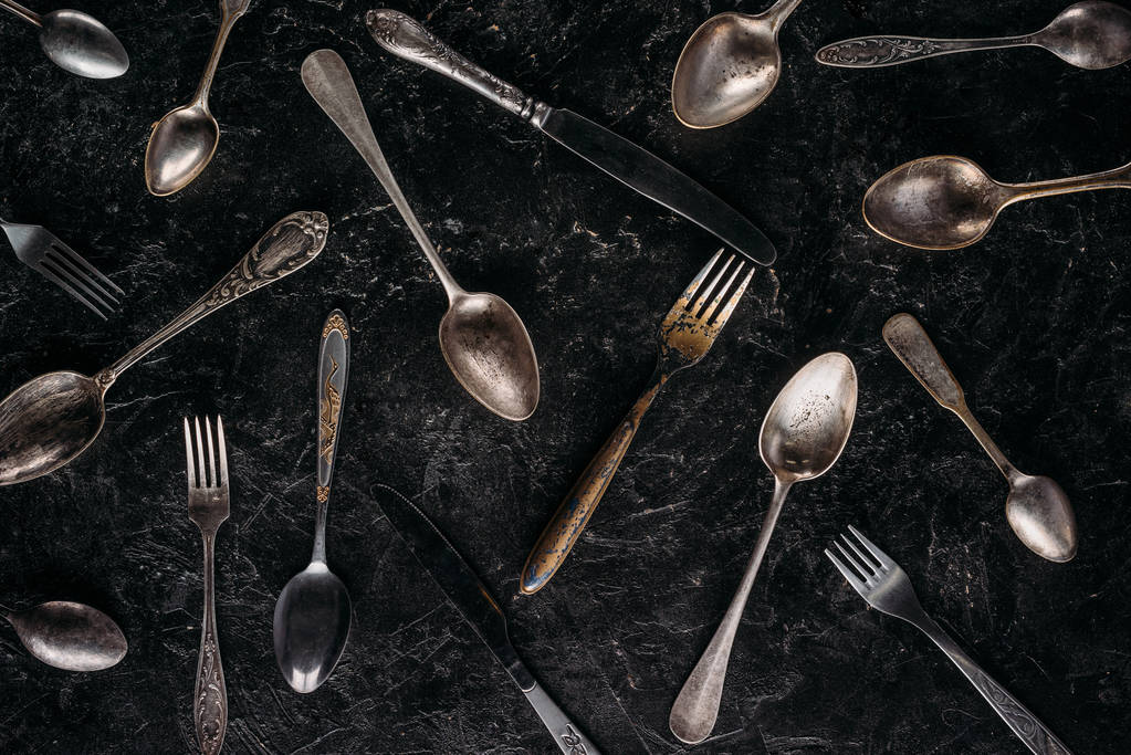 stock photo vintage spoons forks knives dark
